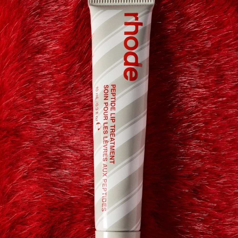 Rhode Peptide Lip treatment limited edition peppermint glaze. Sold out!